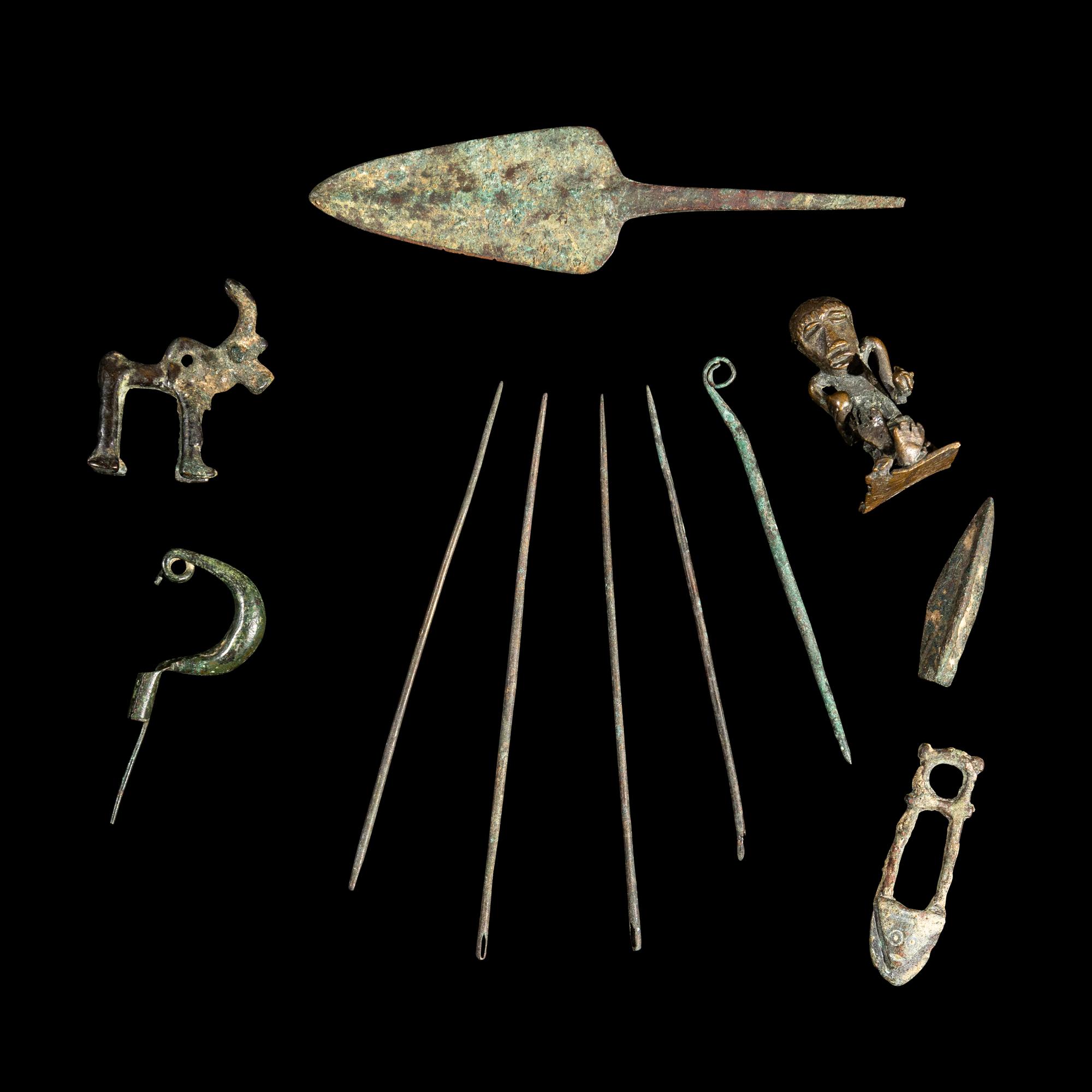 Eleven Luristan Bronze Figures and Implements