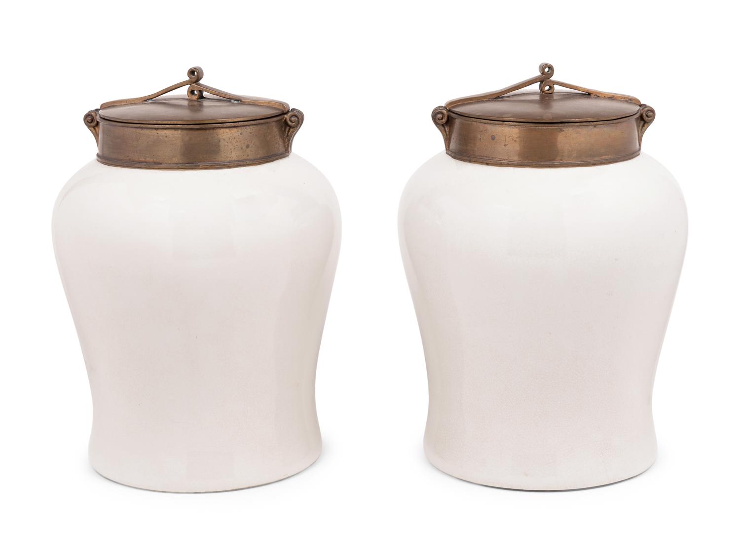 A Pair of Brass Mounted White Glazed Porcelain Jars