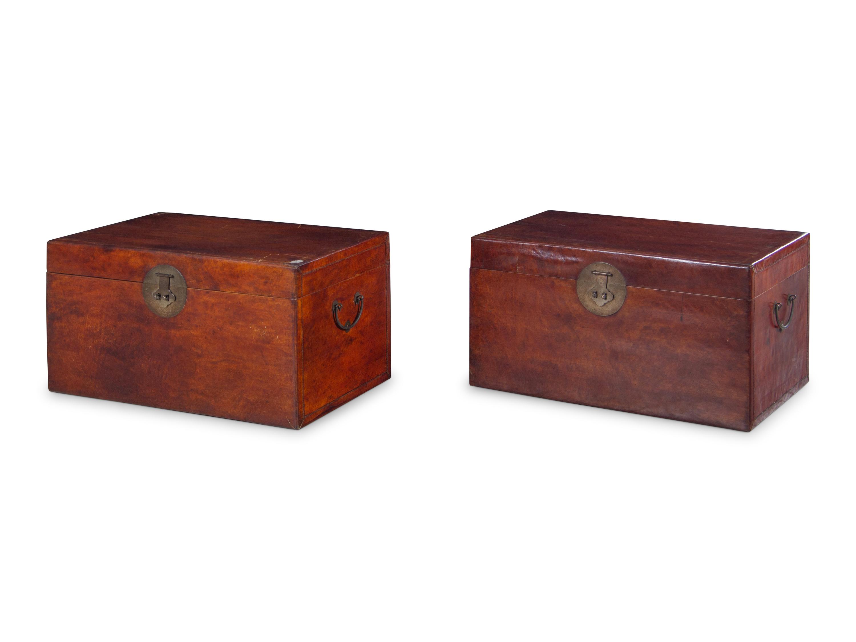 A Pair of Chinese Leather Upholstered Chests