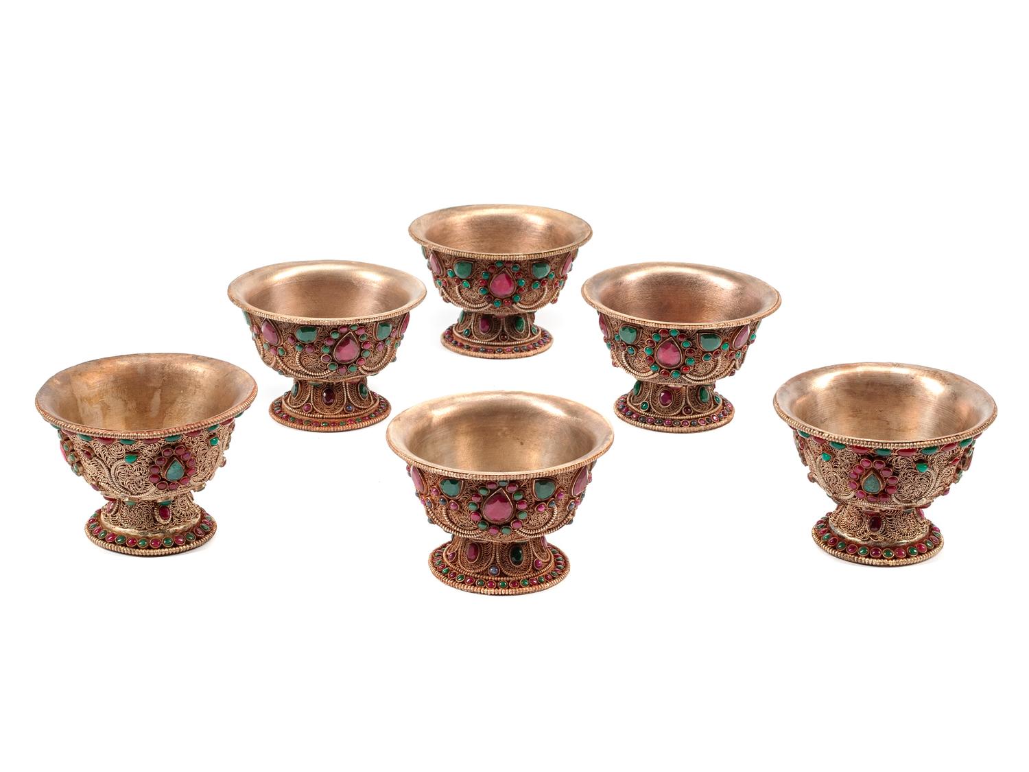 A Set of Six Silvered Filigree Bowls
