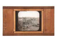 [CIVIL WAR]. GARDNER, Alexander, photographer. A group of 2 images of fallen Confederate soldiers at Antietam, including stereoview and magic lantern slide. Hartford, CT: Taylor & Huntington.