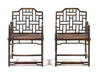 A Pair of Elmwood Armchairs Height of chairs 36 1/4 inches. Height of table 26 1/2 x width 17 3/4 x depth 12 5/8 inches.