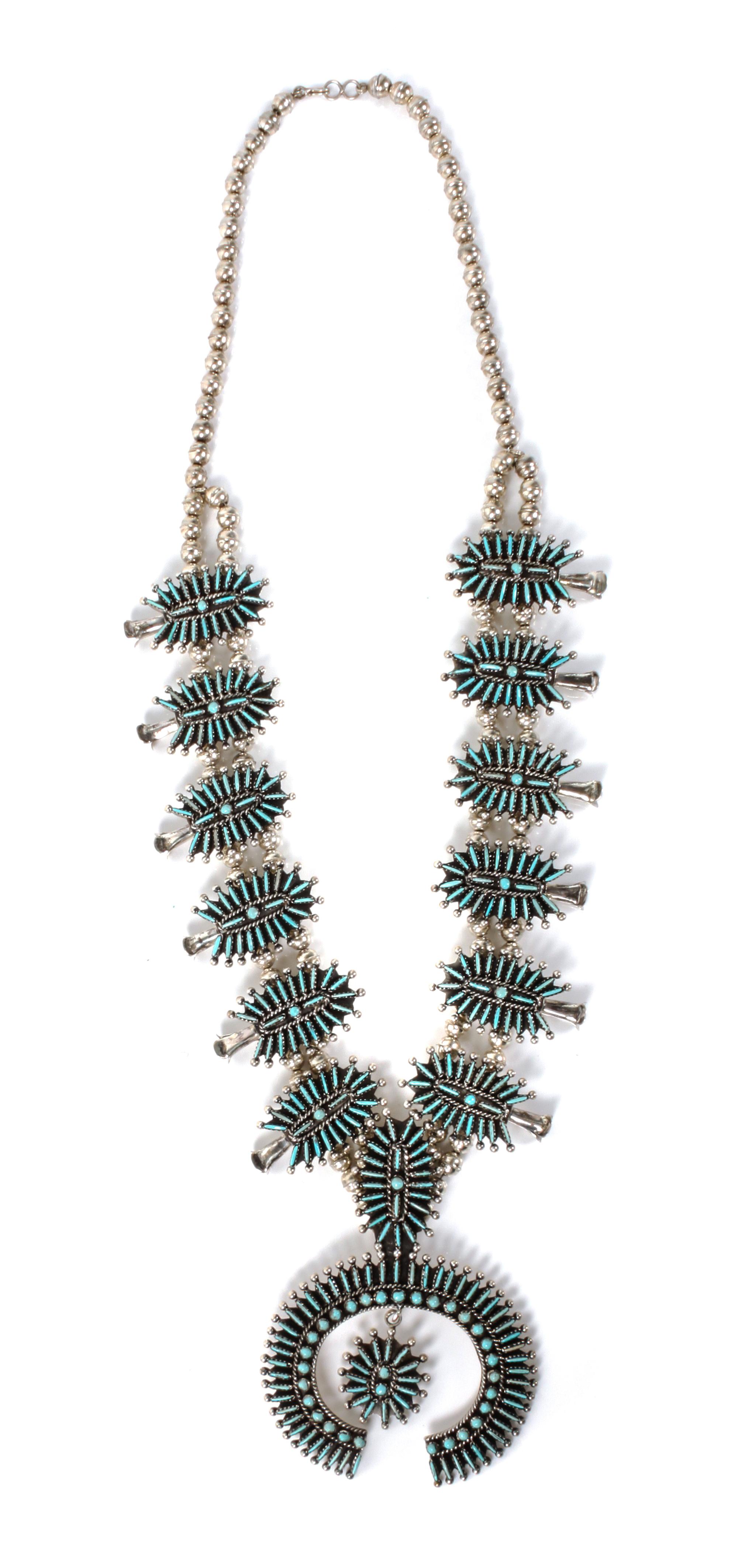 A Zuni Petit Point Squash Blossom Necklace Length 30 inches.