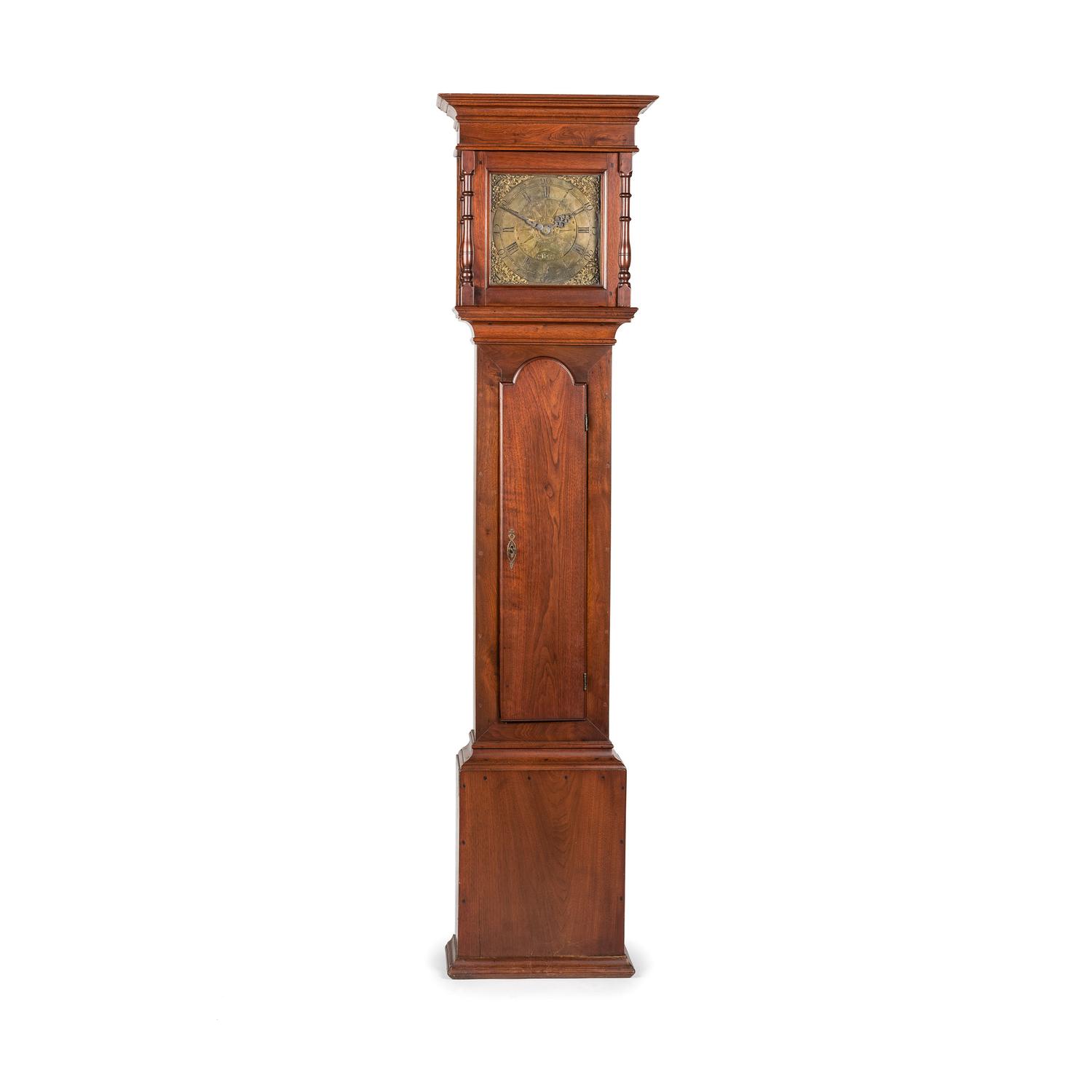 A Queen Anne Walnut Tall Case Clock