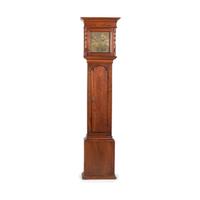A Queen Anne Walnut Tall Case Clock