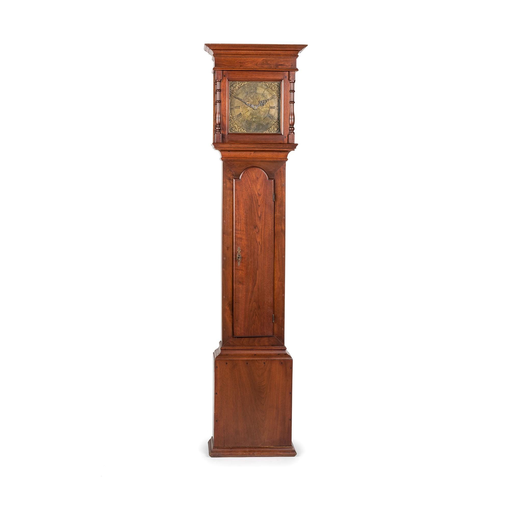 A Queen Anne Walnut Tall Case Clock