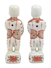 A Pair of Chinese Export Porcelain Models of Standing Boys