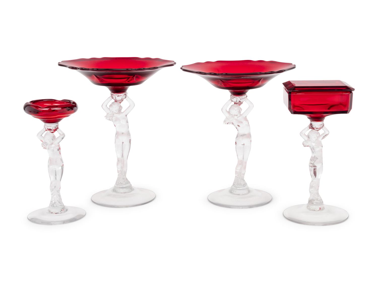 A Group of Clear and Ruby Glass Table Articles