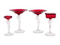 A Group of Clear and Ruby Glass Table Articles