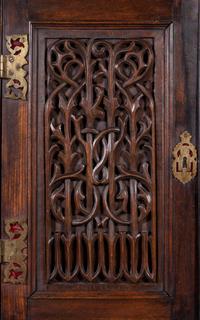 A French Carved Walnut Cabinet