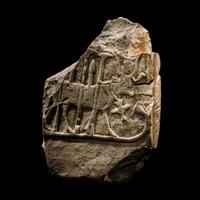 An Egyptian Limestone Stele Fragment with Hathor