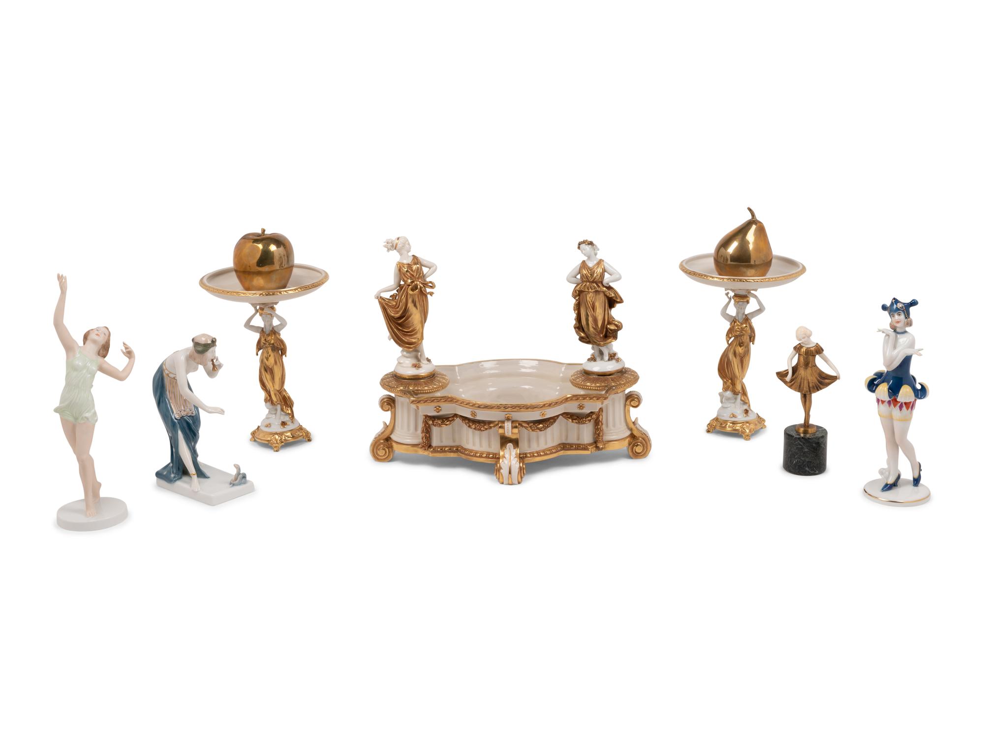 An Assortment of Porcelain and Bronze Figures
