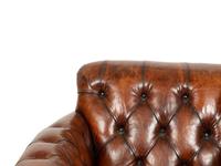 A Pair of Chesterfield Style Leather Club Chairs