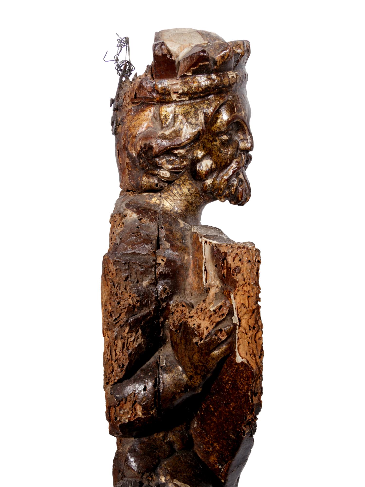 A Continental Carved and Painted Figure of King David Playing the Harp