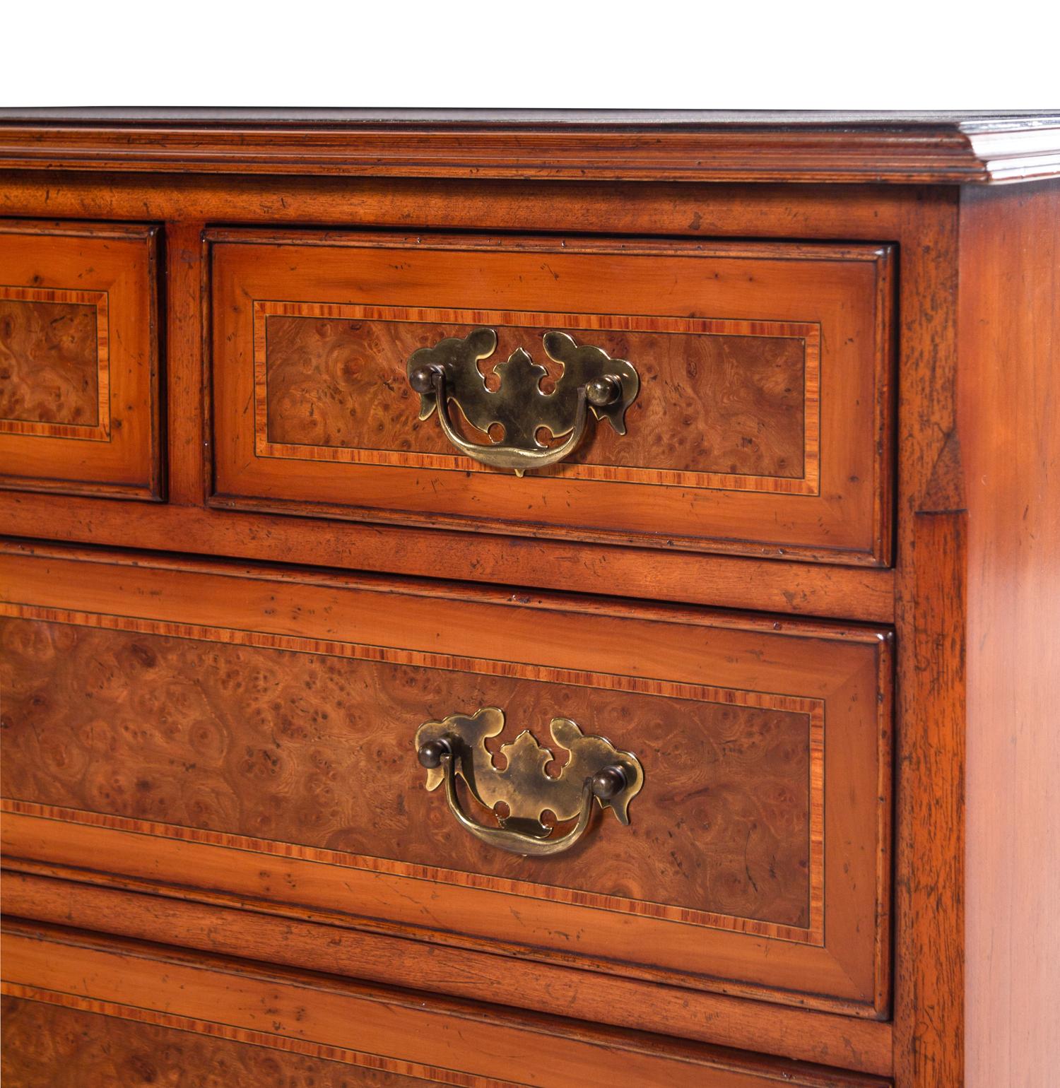 A George III Style Walnut-Veneered Chest of Drawers