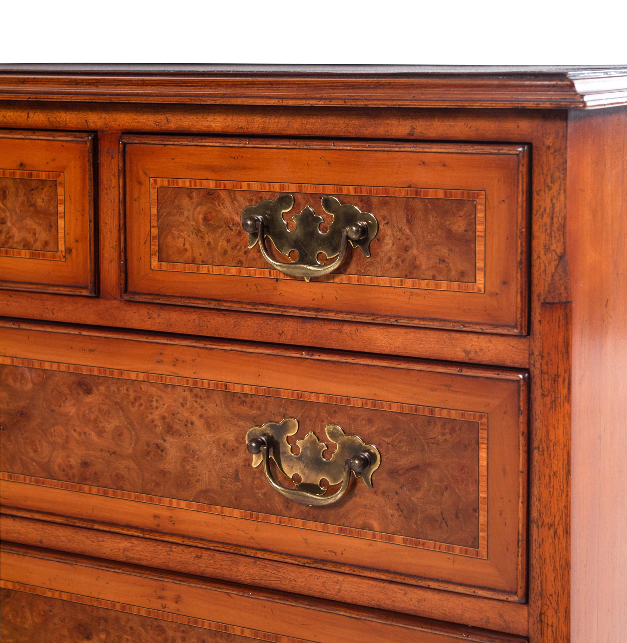 A George III Style Walnut-Veneered Chest of Drawers