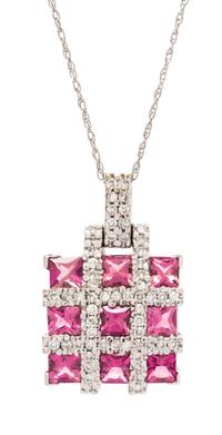 A 14 Karat White Gold, Pink Tourmaline and Diamond Pendant, 3.00 dwts.