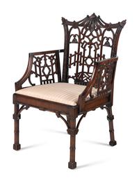 A Pair of George III Style Pierce-Carved Mahogany Armchairs