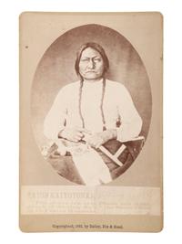 [NATIVE AMERICANS]. Cabinet card of Sitting Bull. Fort Randall, D.T.: Bailey, Dix, & Mead, 1882.