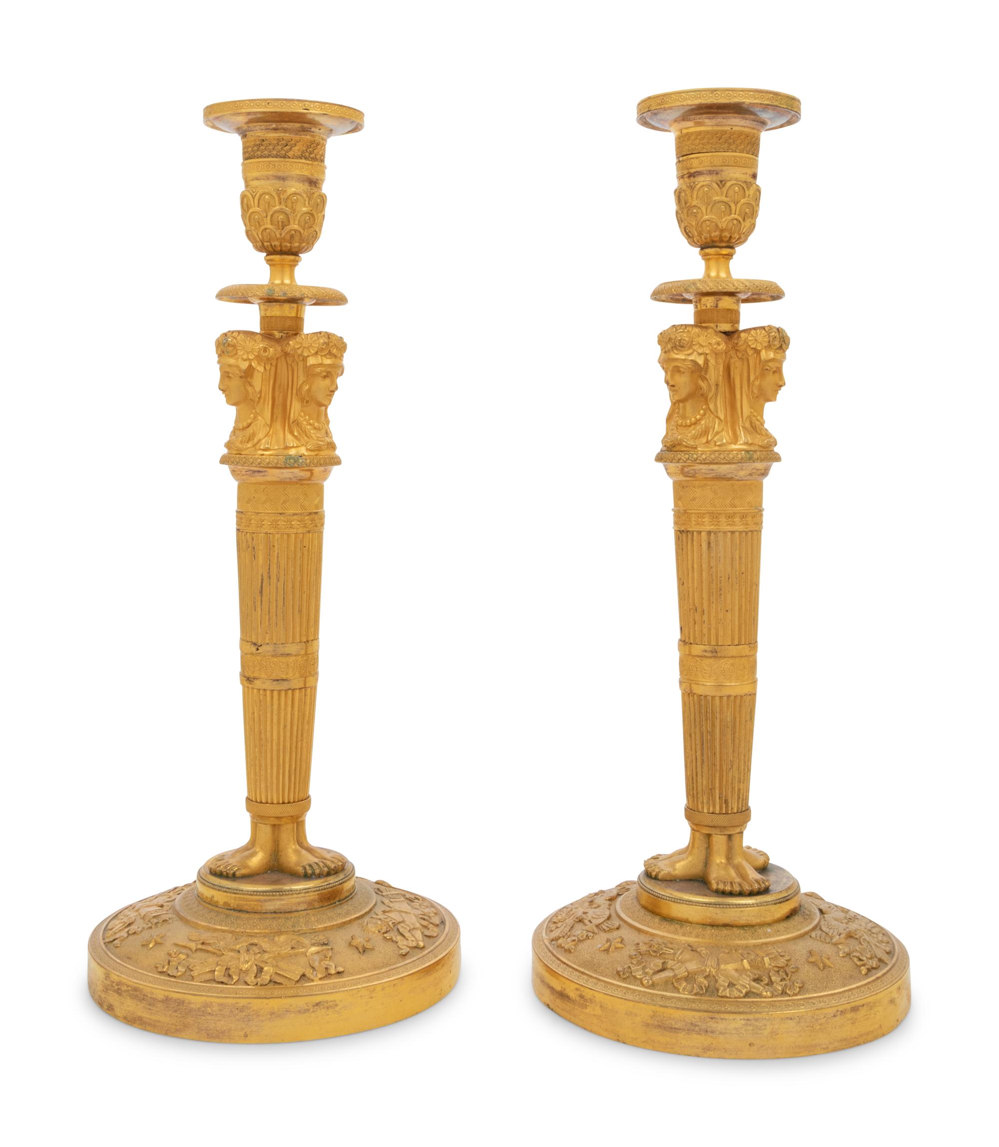 A Pair of Empire Gilt Bronze Candlesticks