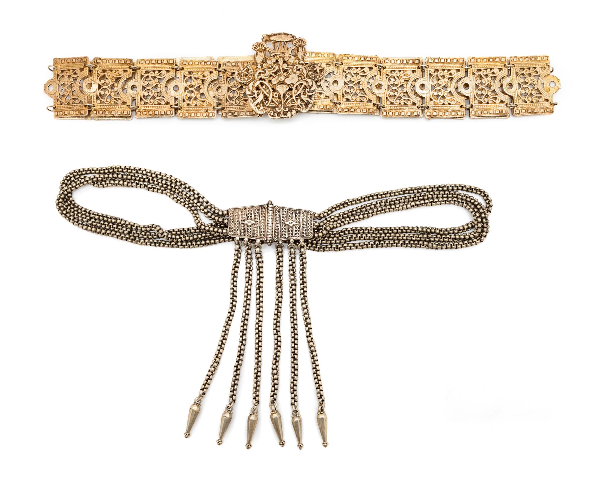 A Collection of Buckles, Belts and Chains