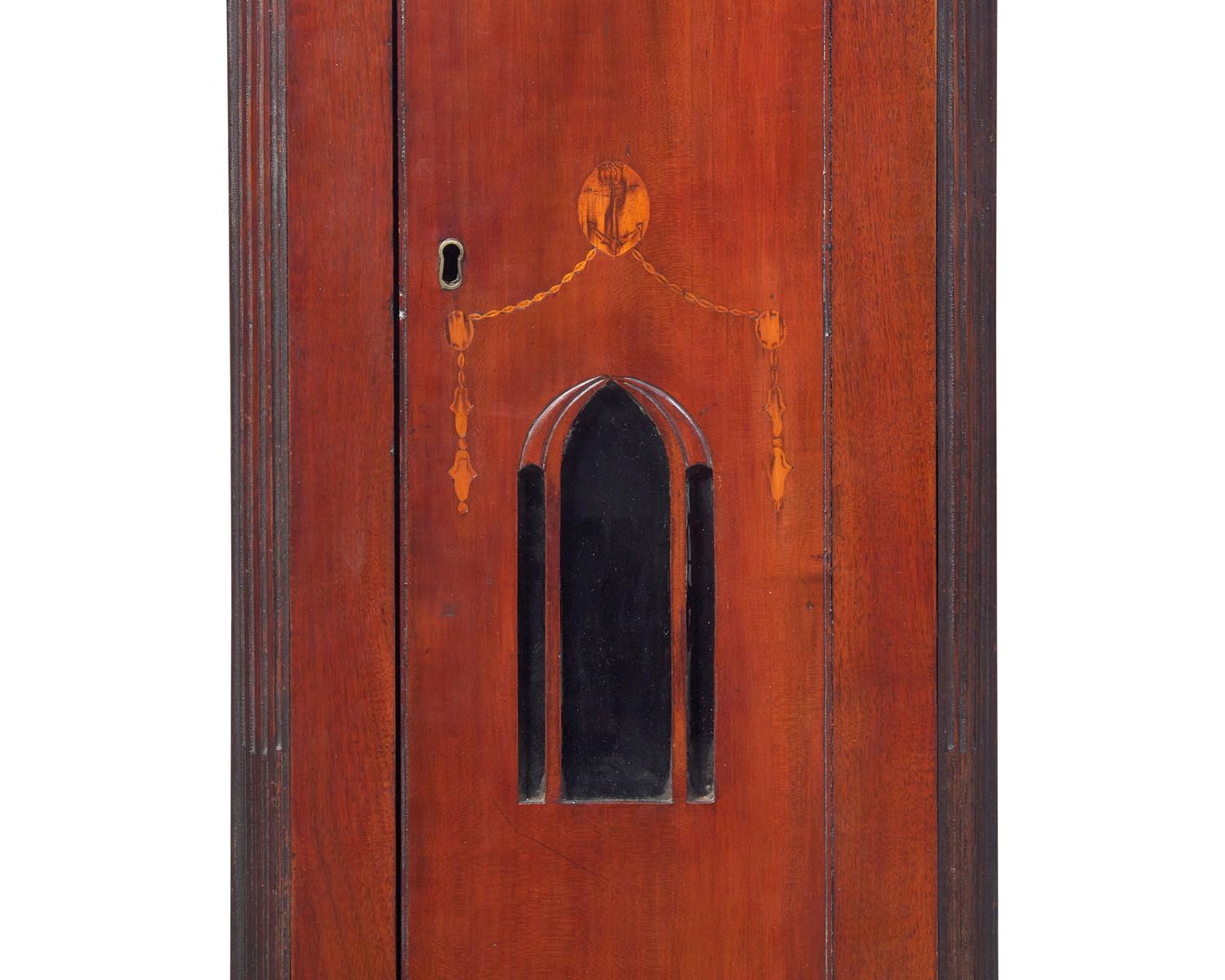 A Federal Carved And Inlaid Walnut and Cherrywood Tall Case Clock