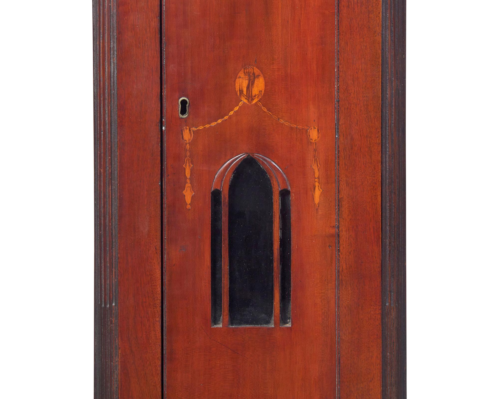 A Federal Carved And Inlaid Walnut and Cherrywood Tall Case Clock