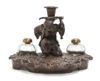 A Continental Terracotta Figural Inkwell, Height 7 inches.
