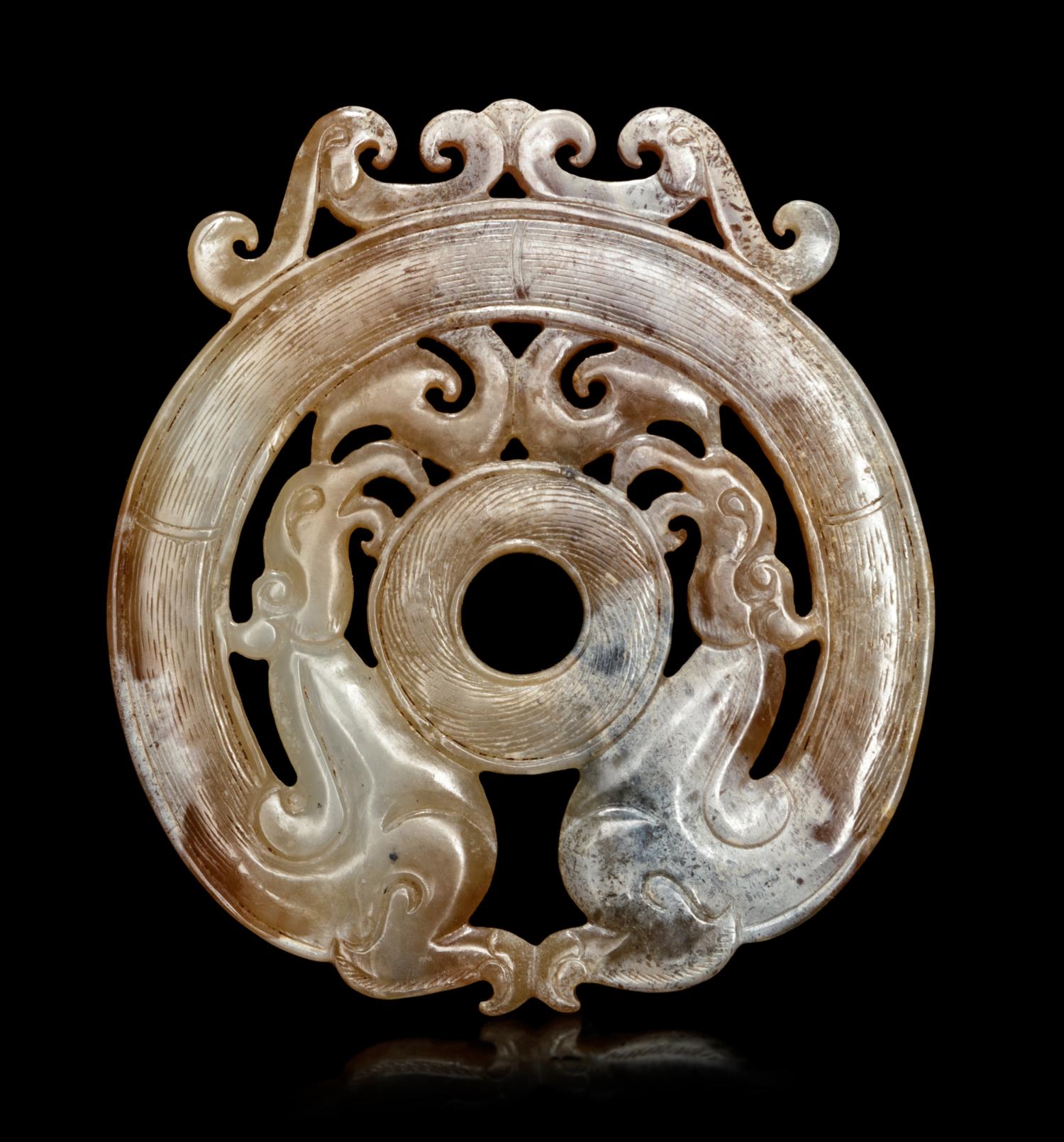 A Mottled Yellow Jade 'Phoenix' Plaque