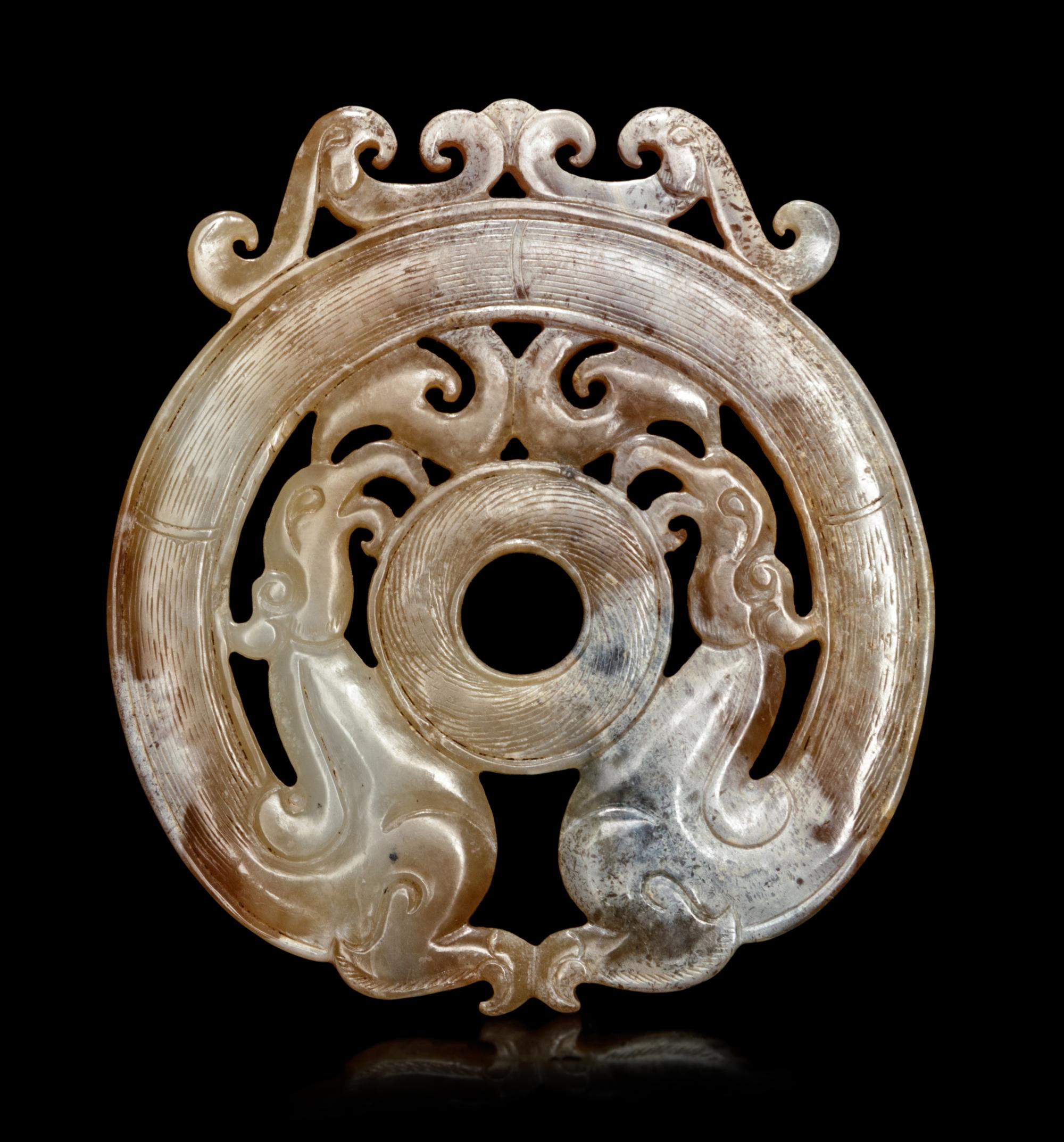A Mottled Yellow Jade 'Phoenix' Plaque
