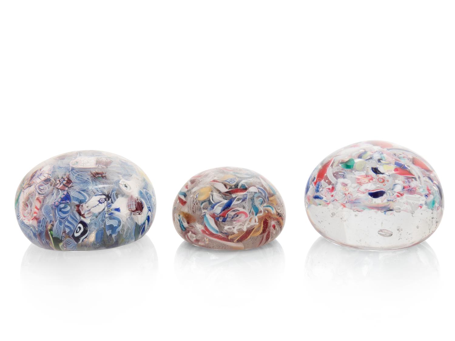 Three End-of-Day Scrambled Cane Glass Paperweights