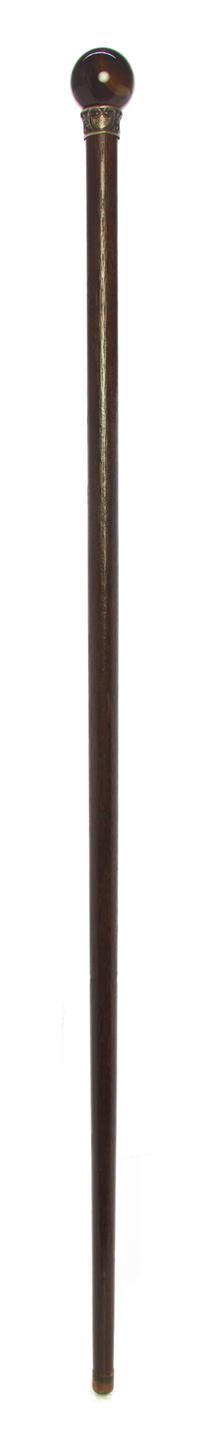 An American Handled Walking Stick, Diameter of handle 1 1/2 x length overall 34 5/8 inches.