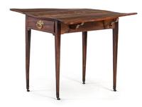 An English Mahogany Drop Leaf Table