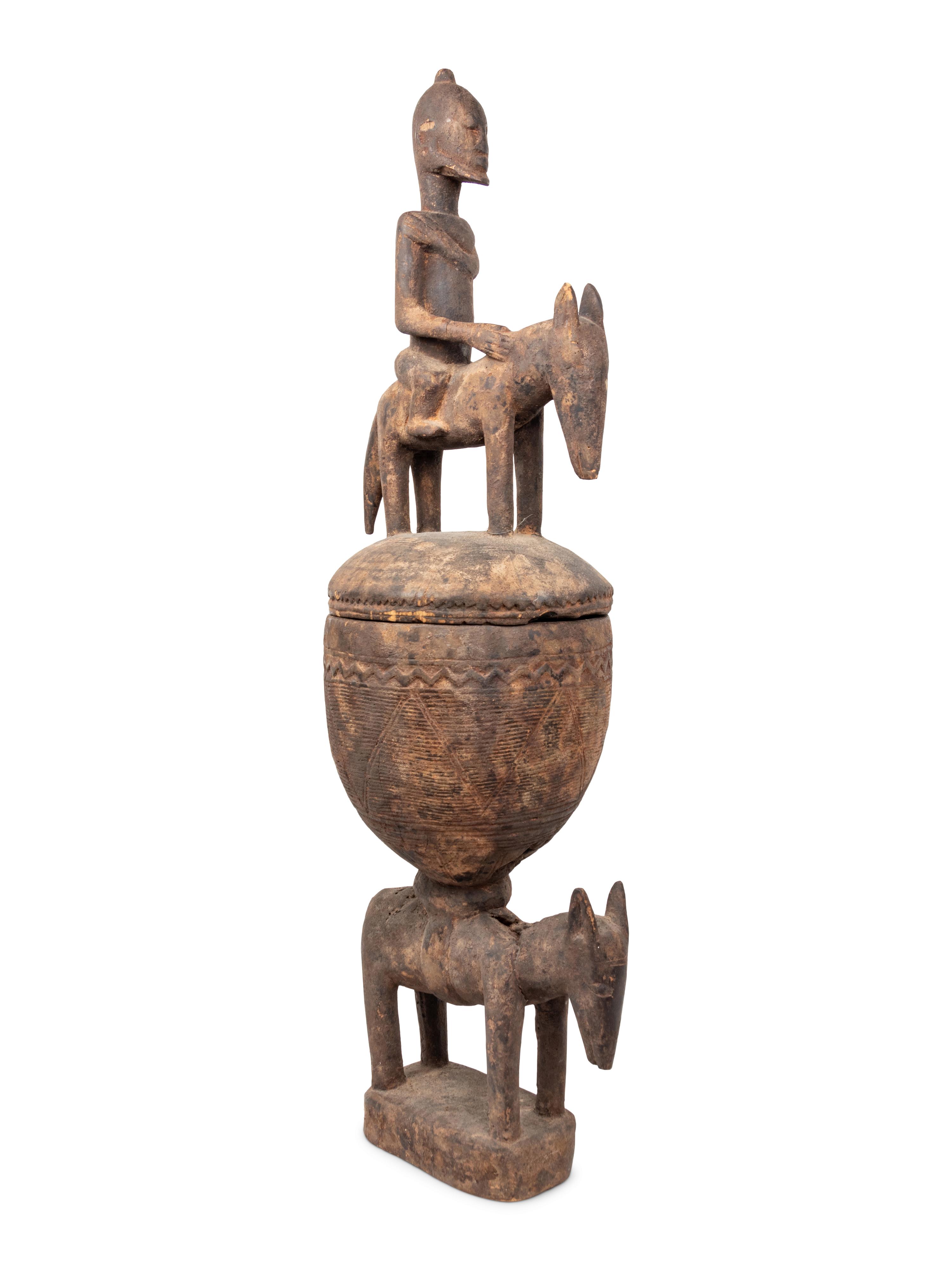 A Dogon Carved Figural Offering Bowl