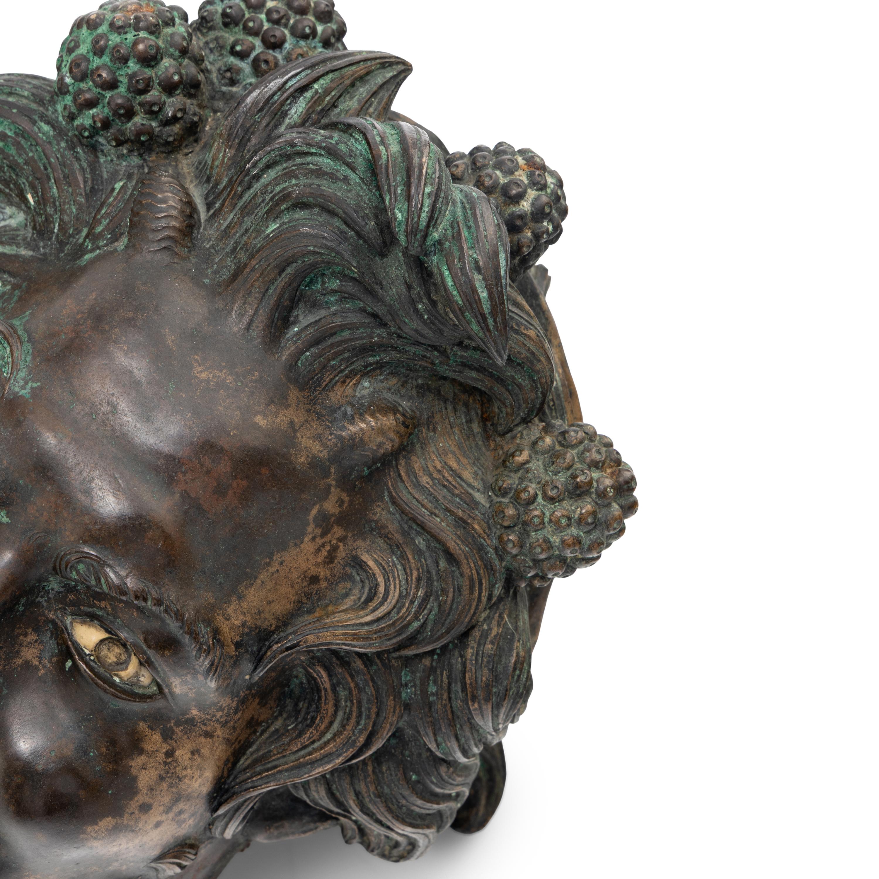 A Group of Three Greek Style Bronze Heads