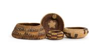 Four Pomo Miniature Baskets Height of largest 2 1/8 x length 4 1/2 inches.