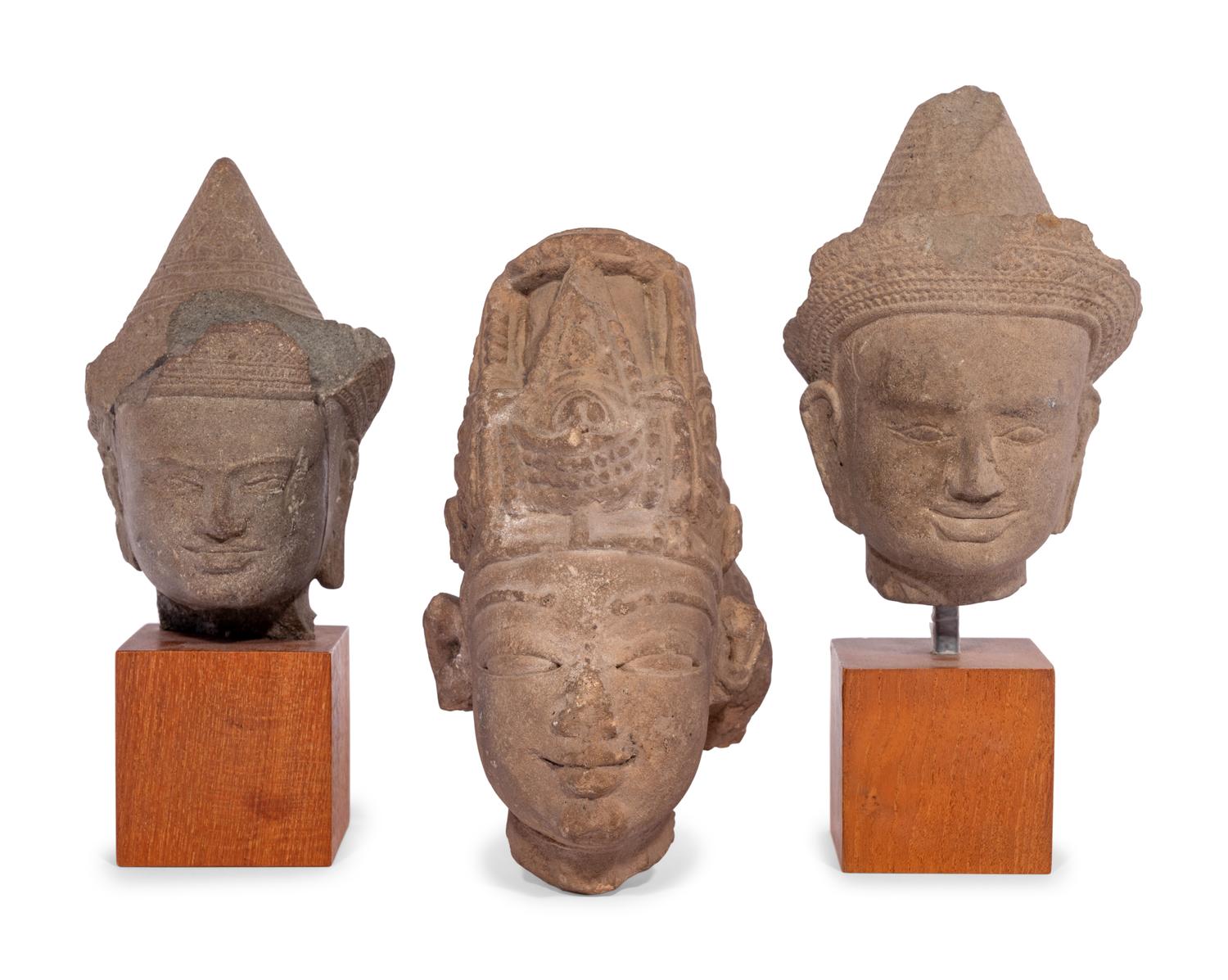Three Carved Stone Heads of Buddha