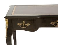 A Louis XV Style Gilt Metal-Mounted Ebonized Bureau Plat