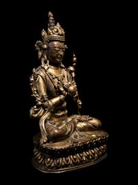 A Tibetan Gilt Bronze Seated Figure of Maitreya