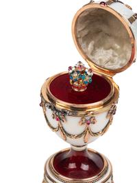 A 14 Karat Vari-Color Gold, Silver, Guilloché Enamel, Diamond, Pearl, and Cabochon Jewel-Mounted Surprise Egg