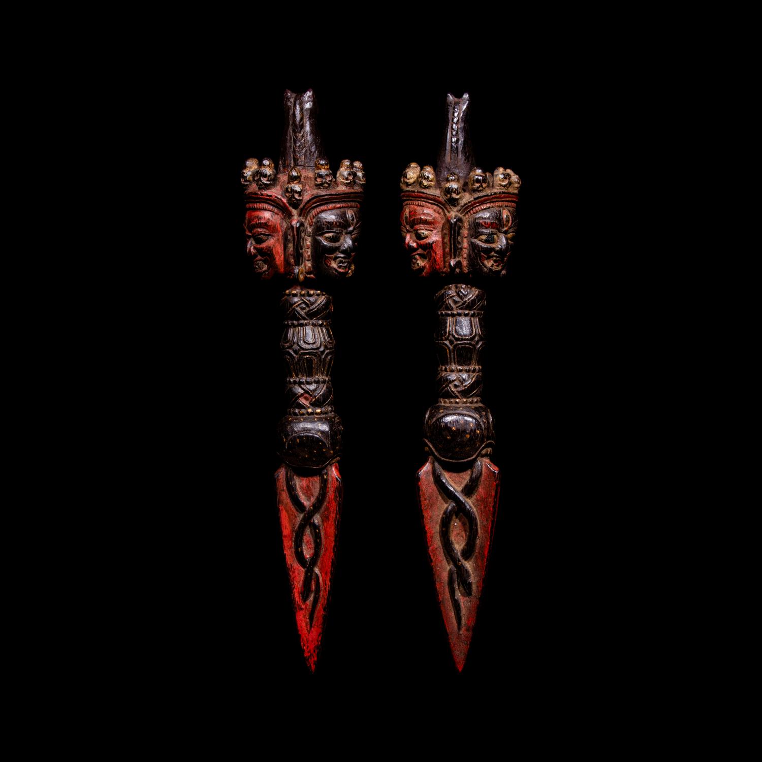 A Pair of Sino-Tibetan Gilt and Red Decorated Wood Vajries, Possibly Zitan, 18th-19th Century — 十八-十九世紀 藏傳彩繪紫檀普巴杵一對