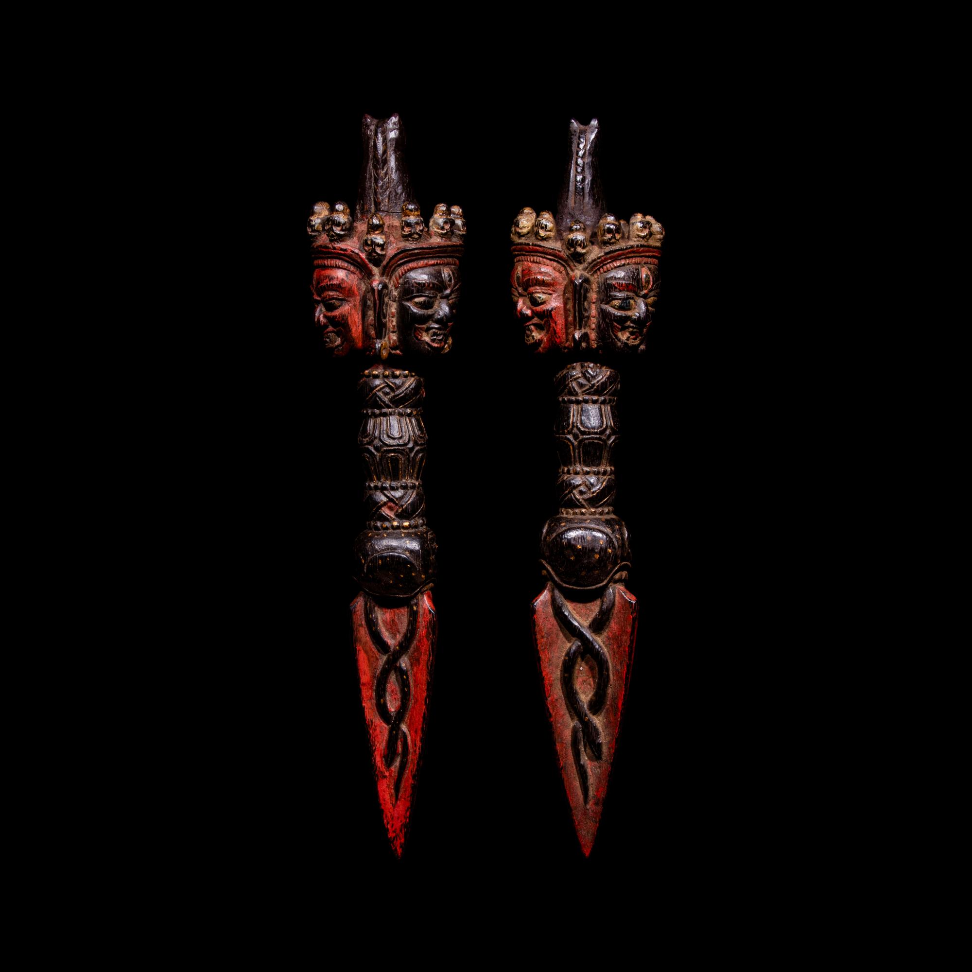 A Pair of Sino-Tibetan Gilt and Red Decorated Wood Vajries, Possibly Zitan, 18th-19th Century — 十八-十九世紀 藏傳彩繪紫檀普巴杵一對