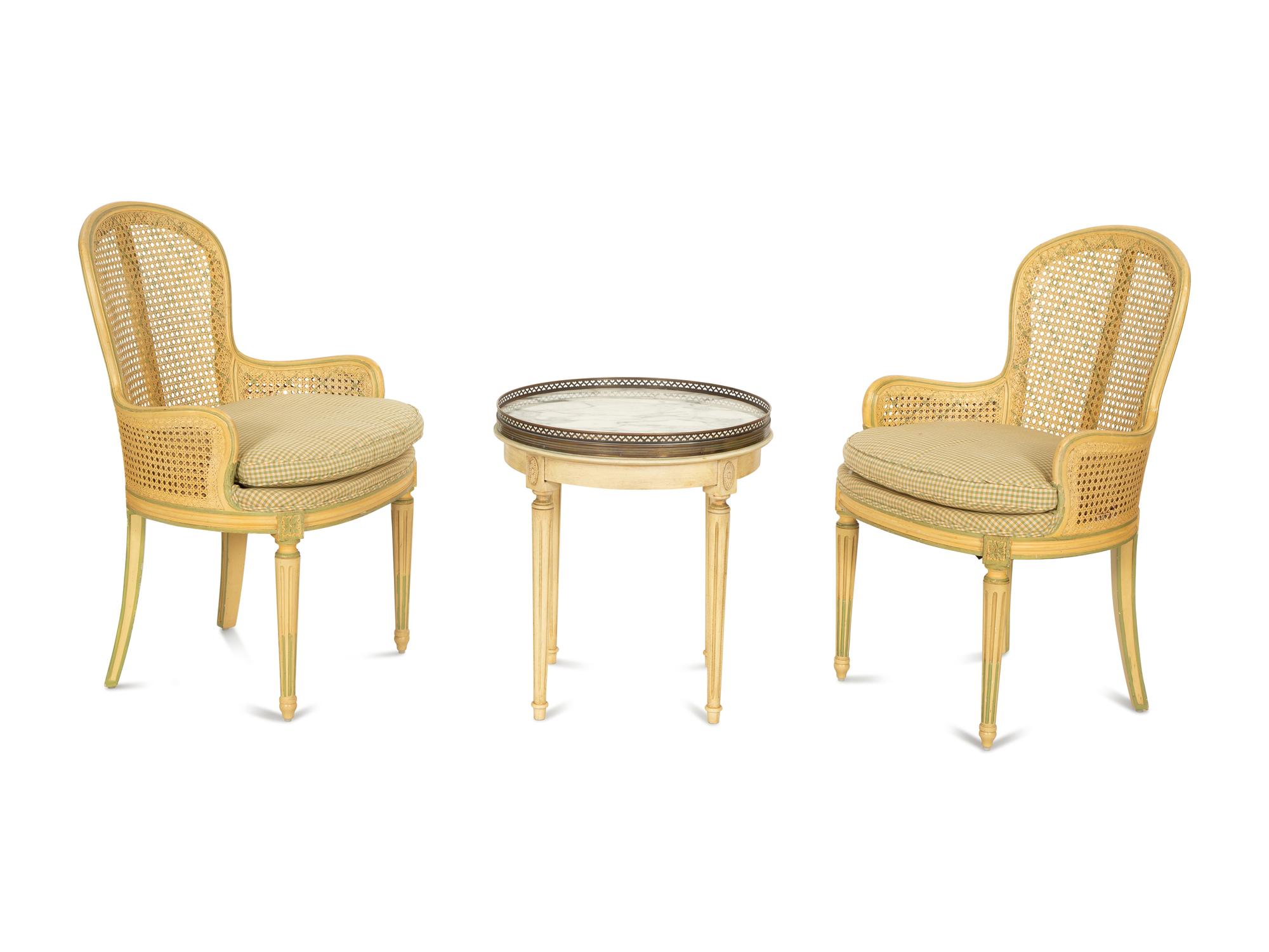 A Pair of Louis XVI Style Painted Caned Back Side Chairs with a Marble Top Gueridon