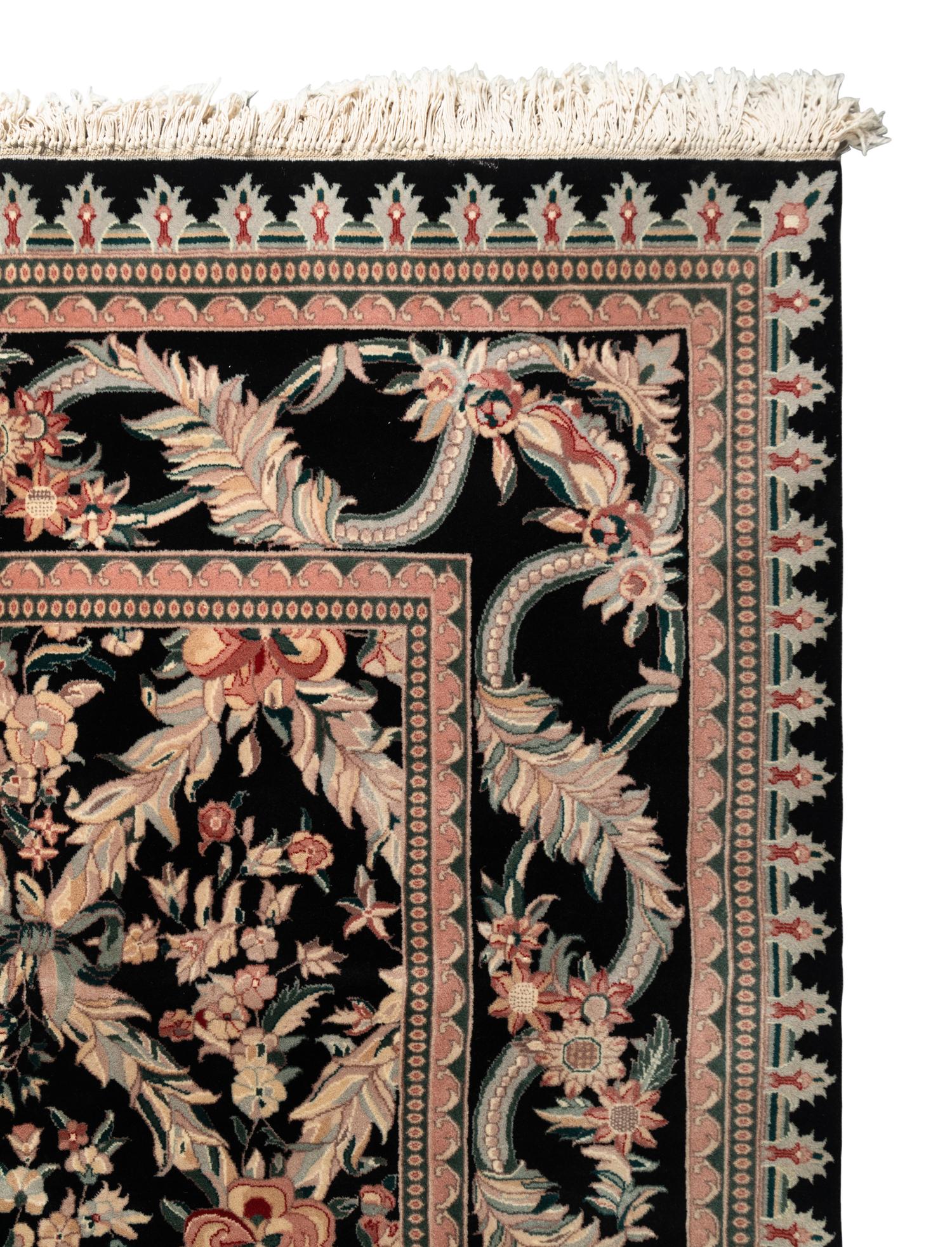 An Indo-Kashan Wool Rug