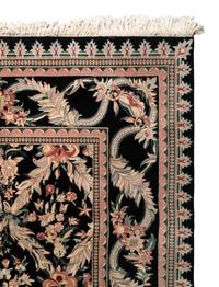 An Indo-Kashan Wool Rug