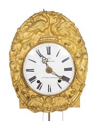 A French Repoussed Brass Comtoise Wall Clock