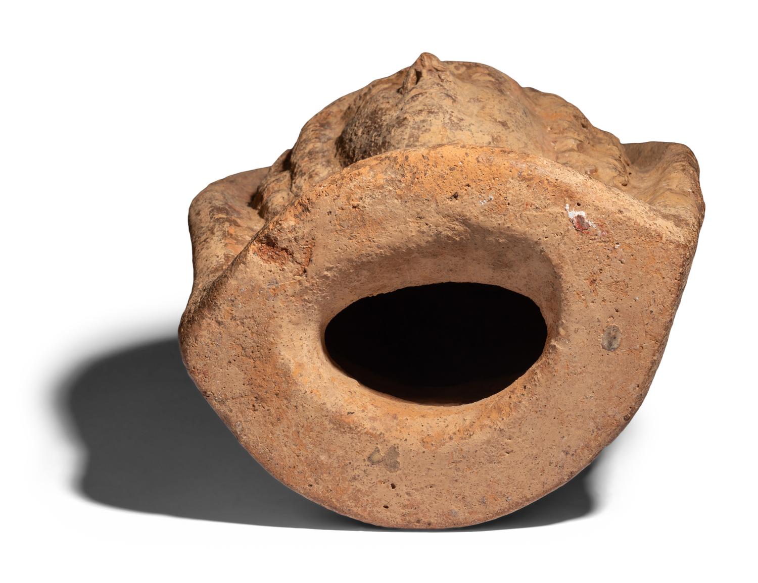 An Etruscan Terracotta Votive Head of a Woman