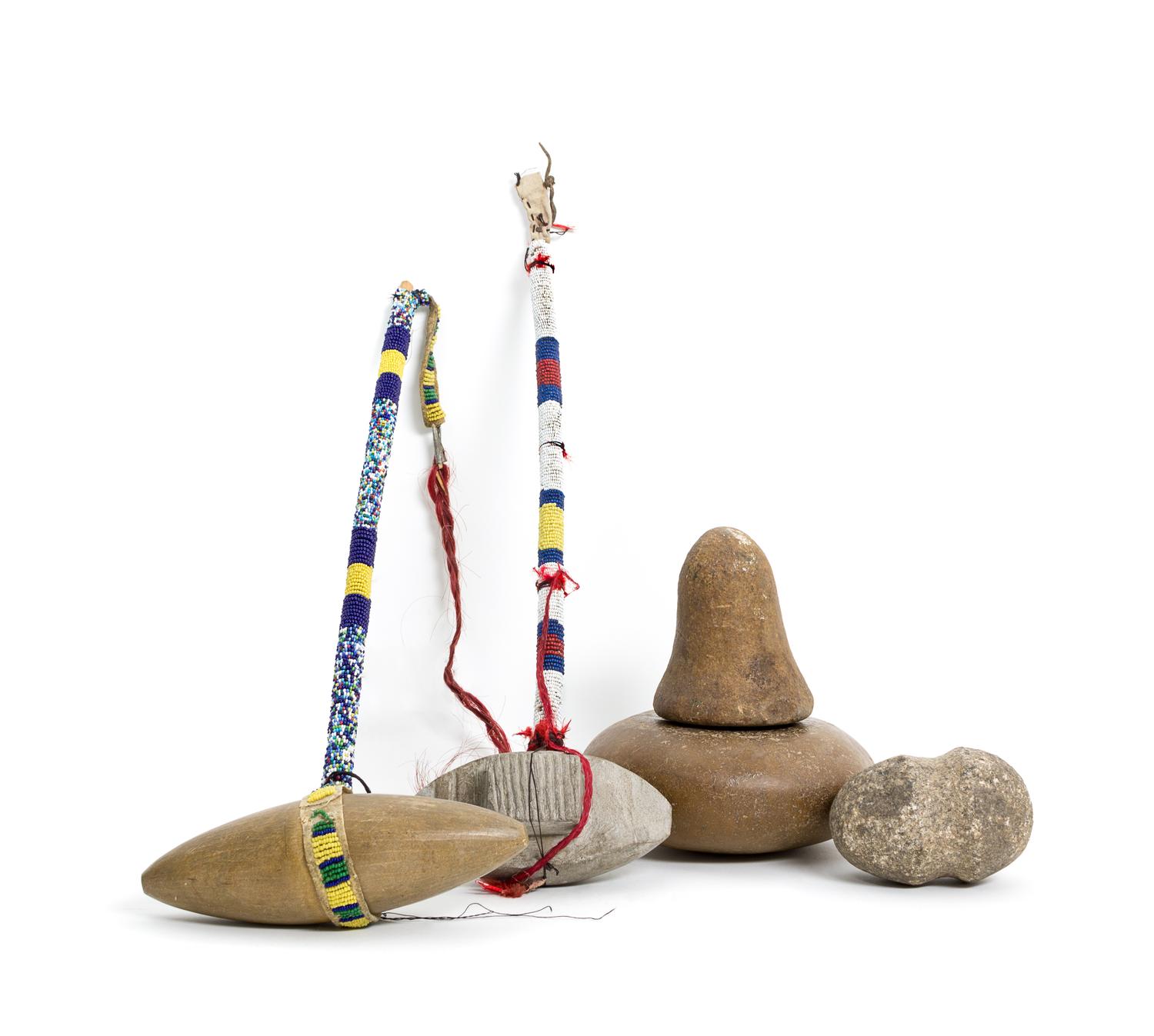 Two Plains Stone Clubs Length of longest 17 1/2 inches.