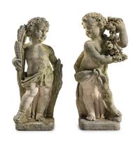 A Pair of Carved Limestone Garden Figures