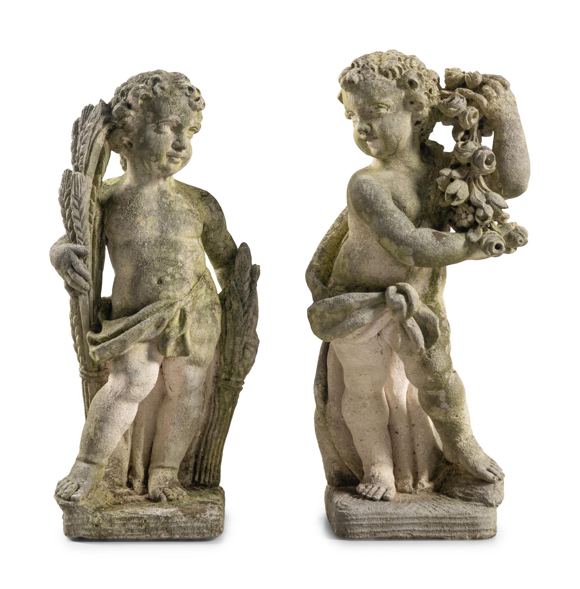 A Pair of Carved Limestone Garden Figures